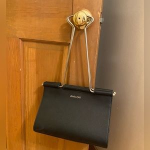 Studio cult vegan leather binder clip bag